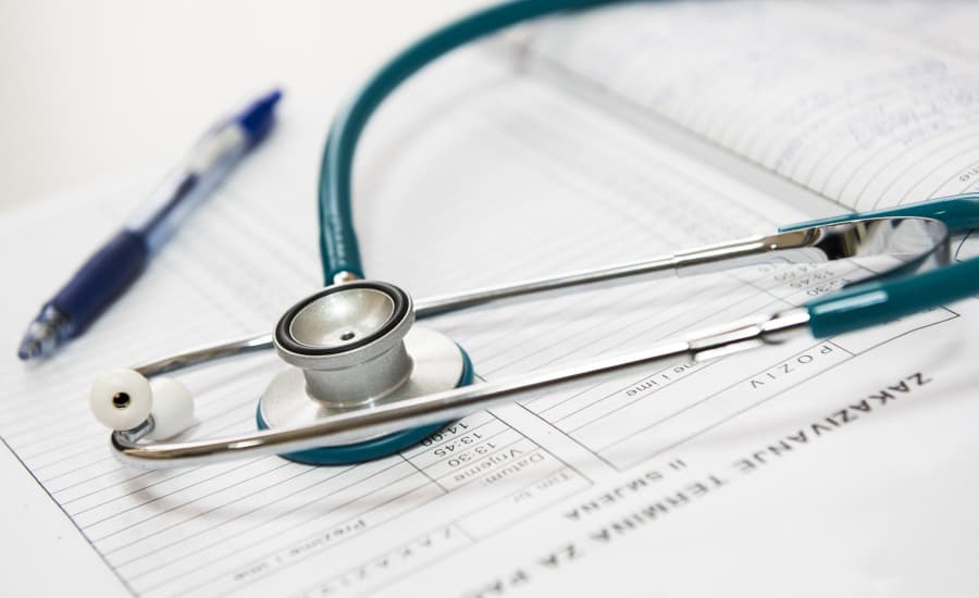 Minneapolis healthcare professional using medical technology requiring HIPAA-compliant IT infrastructure and secure patient data protection for Twin Cities medical practices